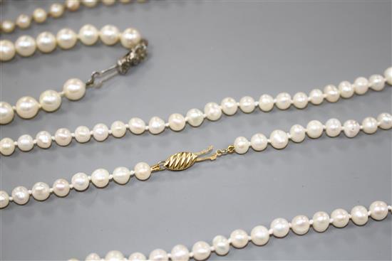 Seven assorted single strand cultured pearl necklaces, three with 925 clasps, two with 935 or 835 clasps and two others